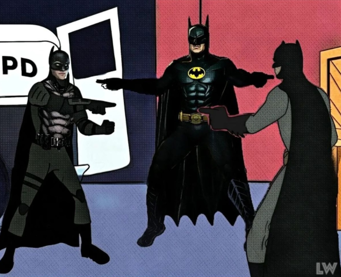 Batman pointing at another Batman